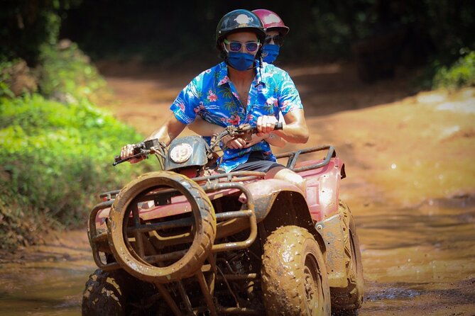 ATV, Ziplining & Cenote Tour, Transportation & Tequila Tasting - Riding an ATV through the jungle