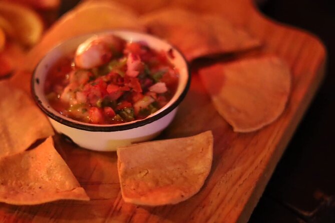 Authentic Artisanal Mezcal tasting in Cancun with appetizers. - Staying for Latin music after the tasting