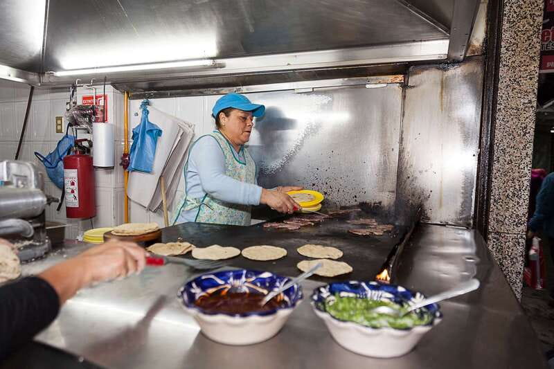 Mexico City: Tacos & Mezcal Night Food Tour - A contemporary taquería changes the rhythm