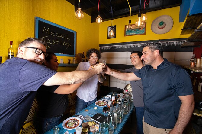 Mucho Gusto's Mezcal Tasting Experience - Tlayuda and Oaxacan flavors at the table