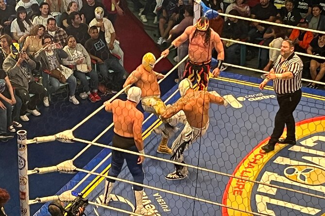 Wrestling + Tacos and Mezcal the best Experience - The show itself: colorful, loud, and not quite a normal sports match
